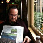 Relaxing with the morning paper at Kennedy School in Portland